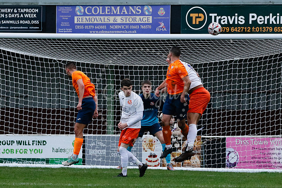 Football action from Diss Town hosting Holland FC.