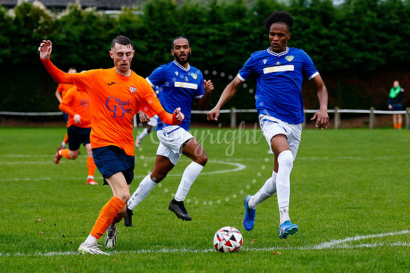 Football action from Diss Town vs FC Peterborough
