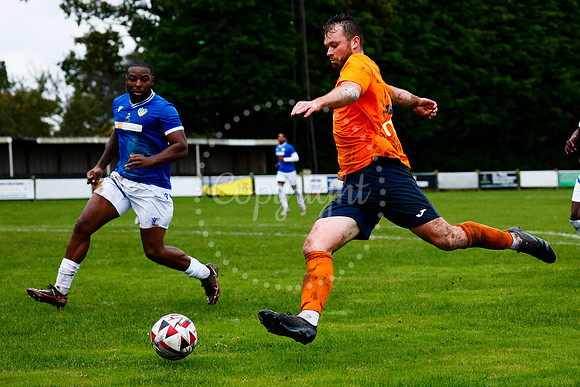 Football action from Diss Town vs FC Peterborough