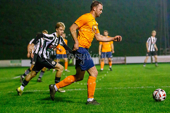 Football action from Diss Town Swaffham Town