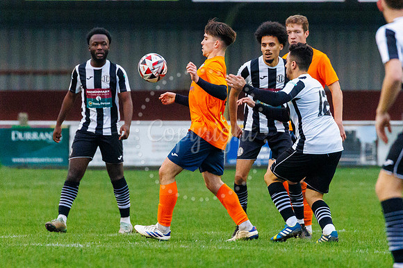Football action from Diss Town Swaffham Town