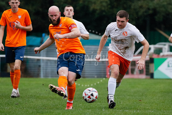 Football action from Diss Town hosting Holland FC.