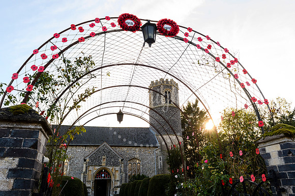 Roydon Village church which has been decorated with poppies to mark the end of the First World War.