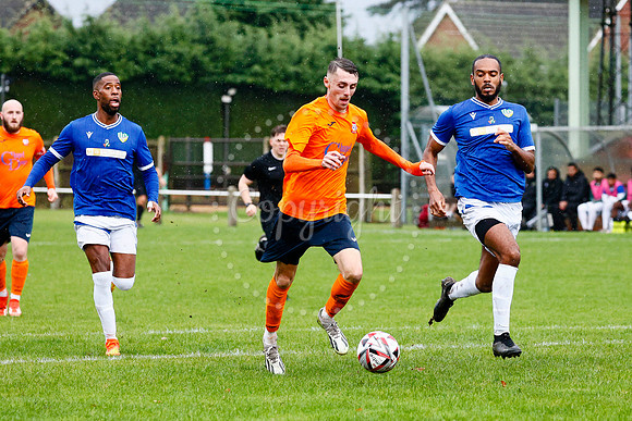 Football action from Diss Town vs FC Peterborough