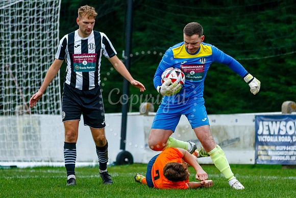 Football action from Diss Town Swaffham Town