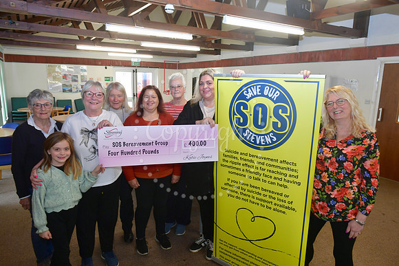 SOS Support Group cheque presentation