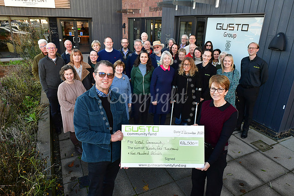 Gusto Community Fund charity cheque presentations
