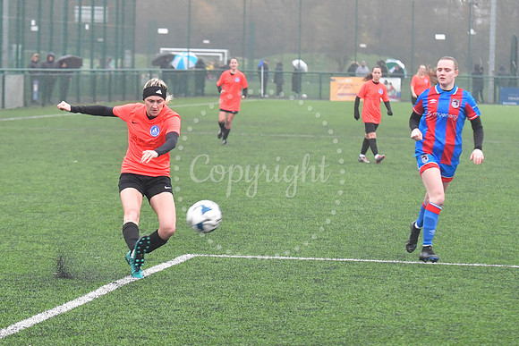Newark Ladies (orange) v Grimsby football action