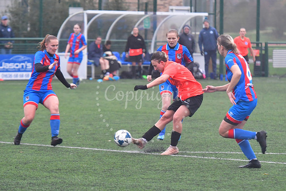 Newark Ladies (orange) v Grimsby football action