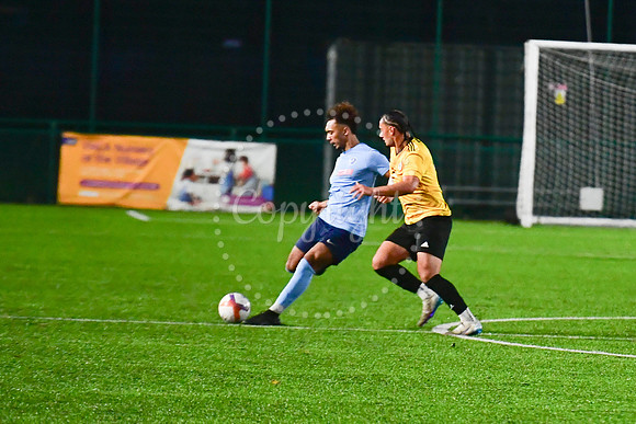 Newark Town (blue) v Harrowby United football (yellow) action