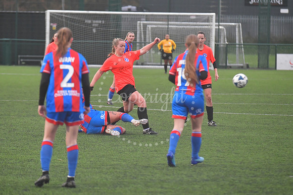 Newark Ladies (orange) v Grimsby football action