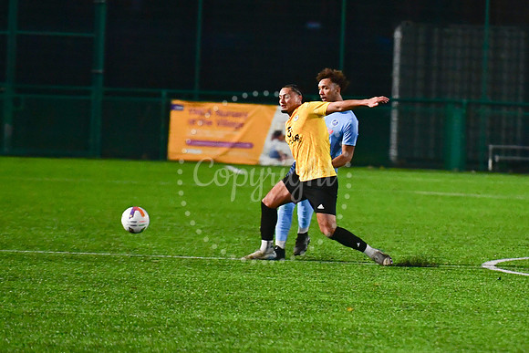 Newark Town (blue) v Harrowby United football (yellow) action
