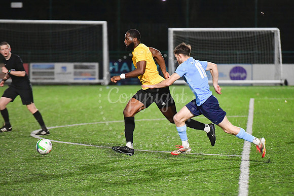 Newark Town (blue) v Harrowby United football (yellow) action
