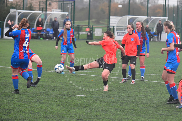 Newark Ladies (orange) v Grimsby football action