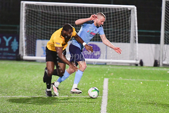 Newark Town (blue) v Harrowby United football (yellow) action