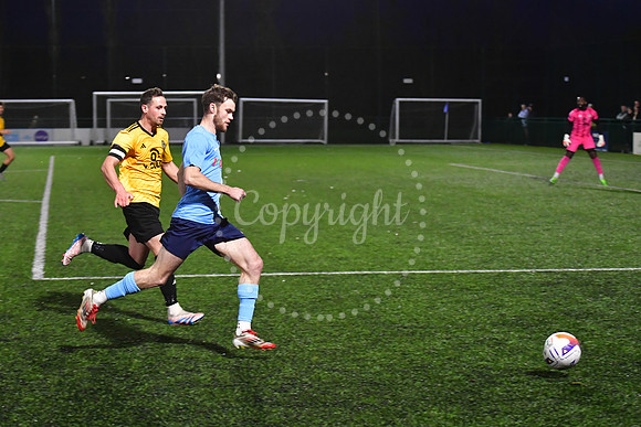 Newark Town (blue) v Harrowby United football (yellow) action