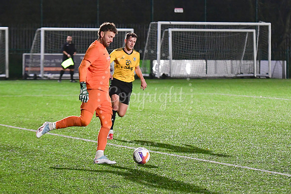 Newark Town (blue) v Harrowby United football (yellow) action
