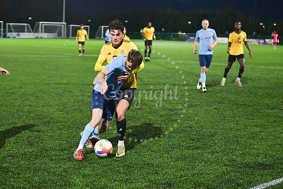 Newark Town (blue) v Harrowby United football (yellow) action