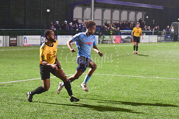 Newark Town (blue) v Harrowby United football (yellow) action