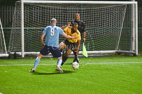 Newark Town (blue) v Harrowby United football (yellow) action