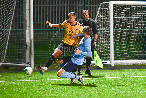 Newark Town (blue) v Harrowby United football (yellow) action