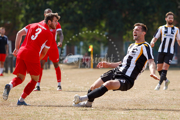 Football action from Harleston v Woodbridge