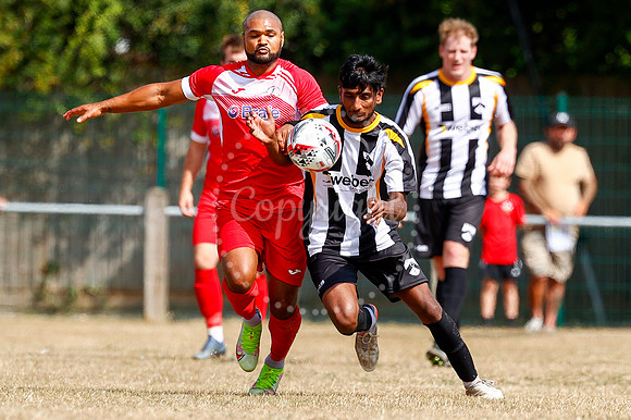 Football action from Harleston v Woodbridge