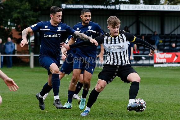 Football action from Harleston vs Bramtham Athletic