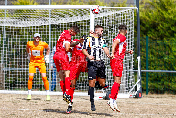 Football action from Harleston v Woodbridge