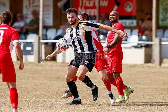 Football action from Harleston v Woodbridge