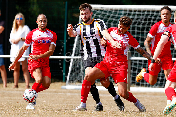 Football action from Harleston v Woodbridge