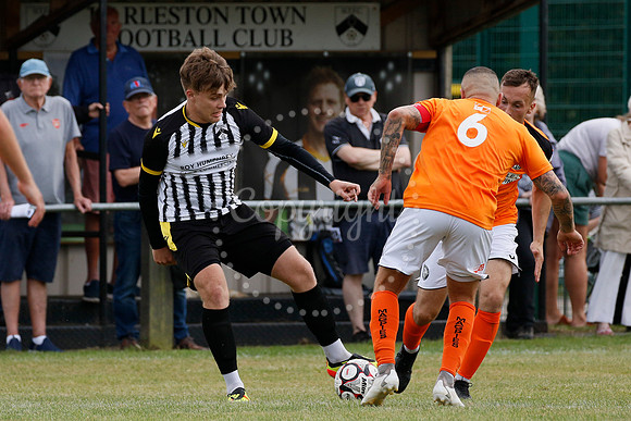 Football action from Harleston Town vs Heacham
