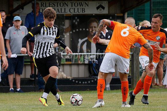 Football action from Harleston Town vs Heacham