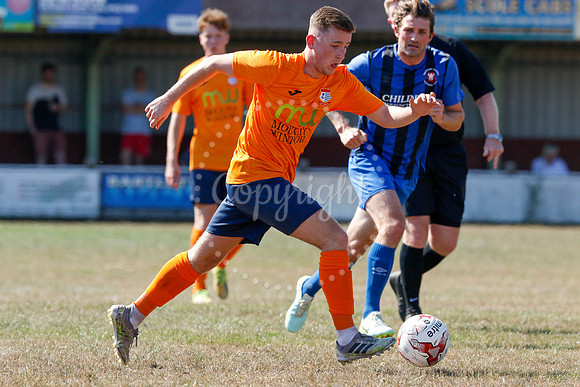 Football action from Diss Town v Whittlesey Athletic.