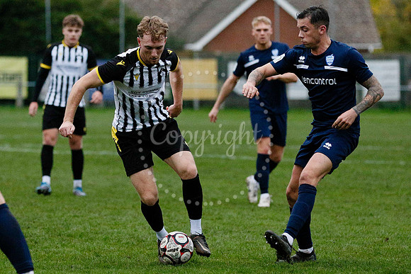 Football action from Harleston vs Bramtham Athletic