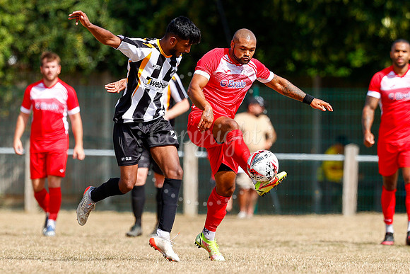 Football action from Harleston v Woodbridge