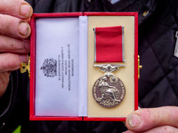 Framlingham shop owner Bill Bulstrode has been awarded a BEM med