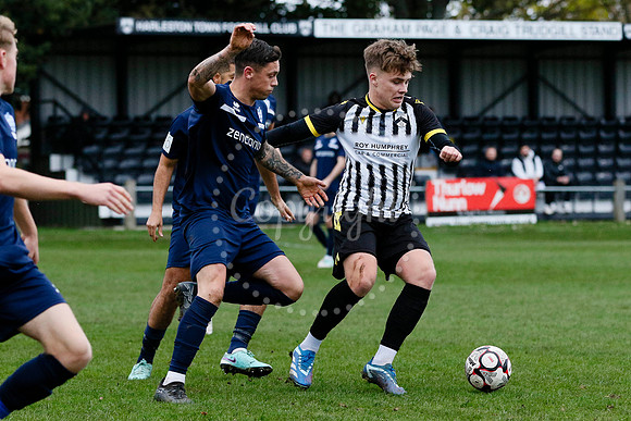 Football action from Harleston vs Bramtham Athletic