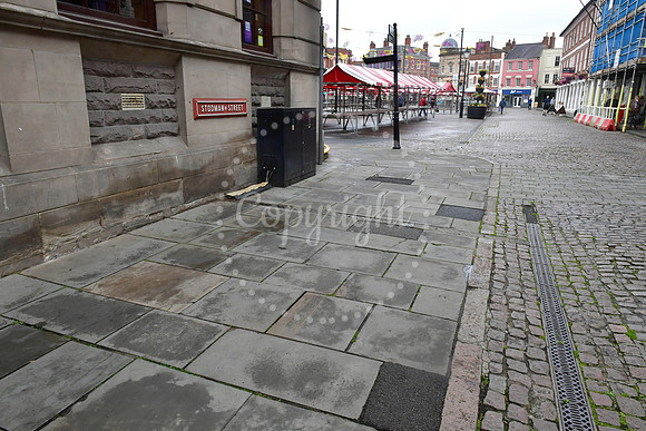 Loose paving slabs at Newark Market Place