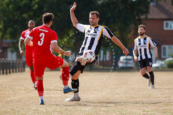 Football action from Harleston v Woodbridge