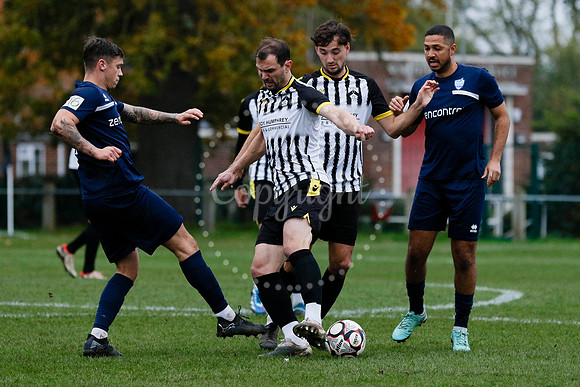 Football action from Harleston vs Bramtham Athletic