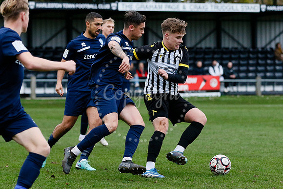 Football action from Harleston vs Bramtham Athletic