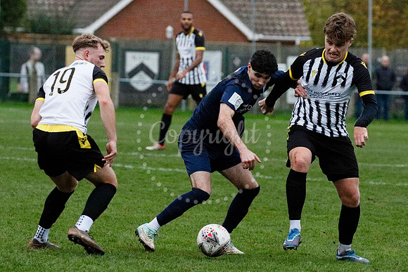 Football action from Harleston vs Bramtham Athletic