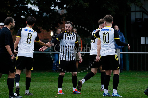 Football action from Harleston vs Bramtham Athletic