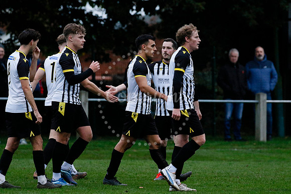 Football action from Harleston vs Bramtham Athletic