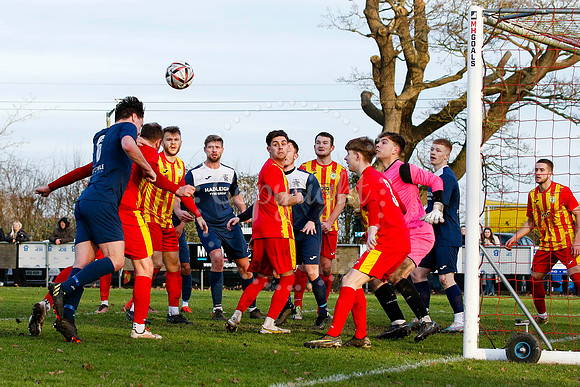 Football action from Walsham-le-Willows vs Hadleigh United.