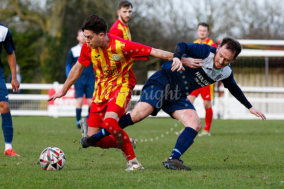Football action from Walsham-le-Willows vs Hadleigh United.