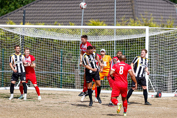 Football action from Harleston v Woodbridge