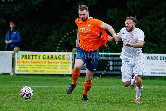 Football action from Diss Town vs Holland FC
