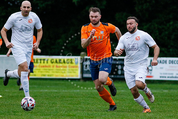 Football action from Diss Town vs Holland FC